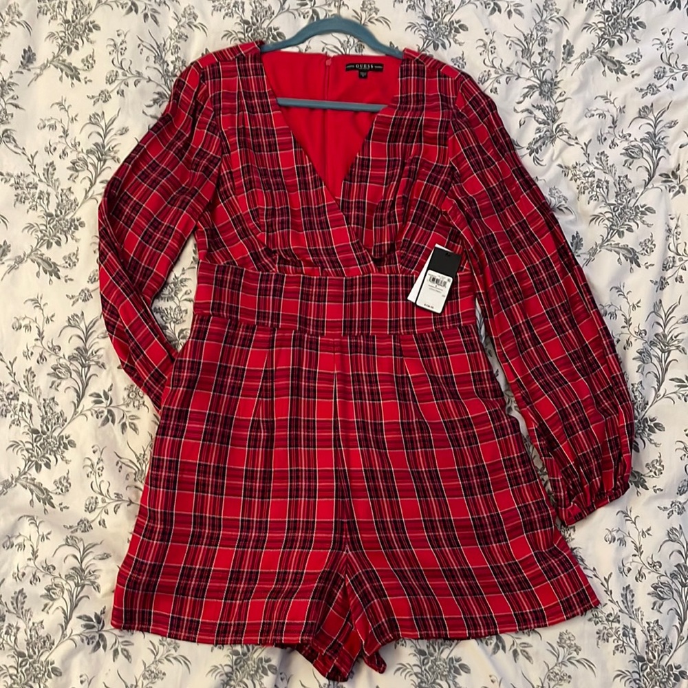 Red and navy blue plaid long sleeve shorts romper.